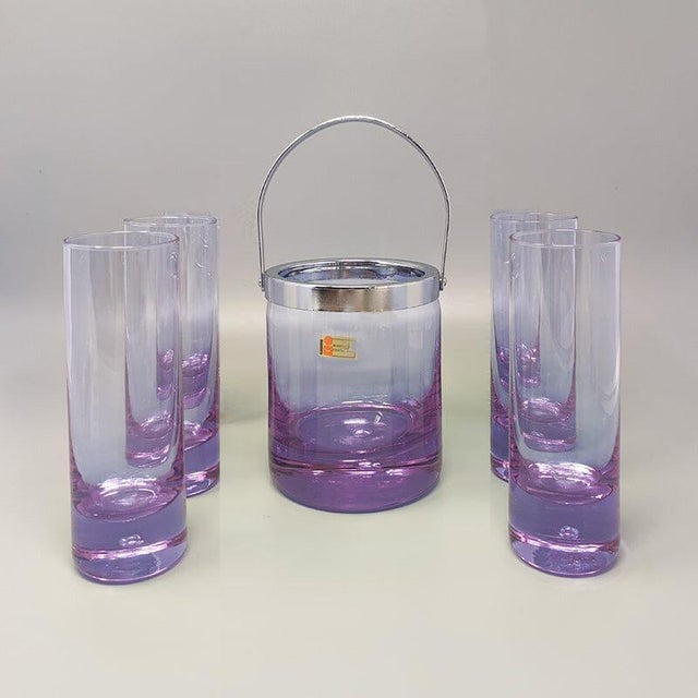 1970s gorgeous crystal ice bucket with 4 glasses by ivat. Made in italy from the 1970s. The items are in excellent...