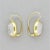 A special unique pair of earrings featuring two moonstone cameos which are hand carved to depict faces! The moonstones are...