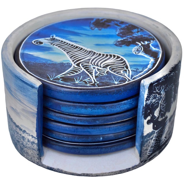 One-of-a-kind gorgeous vintage set of six coasters and matching box, hand-carved from natural heavy soapstone with a...