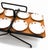 Cool mid century black iron and wood tabletop rack holding a set of eight small white porcelain plates with an orange and...