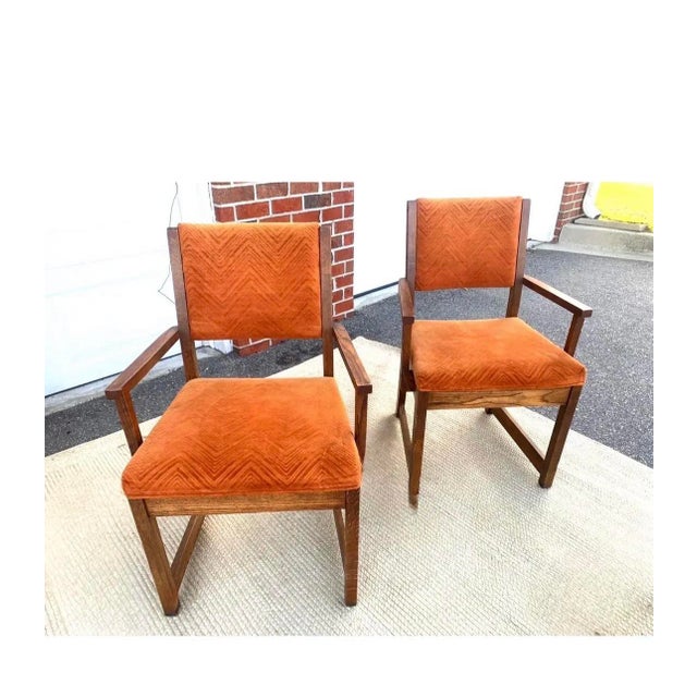 Incredible burnt orange vibrant velvet fabric in excellent condition, these 4 mcm chairs are the perfect combination of...