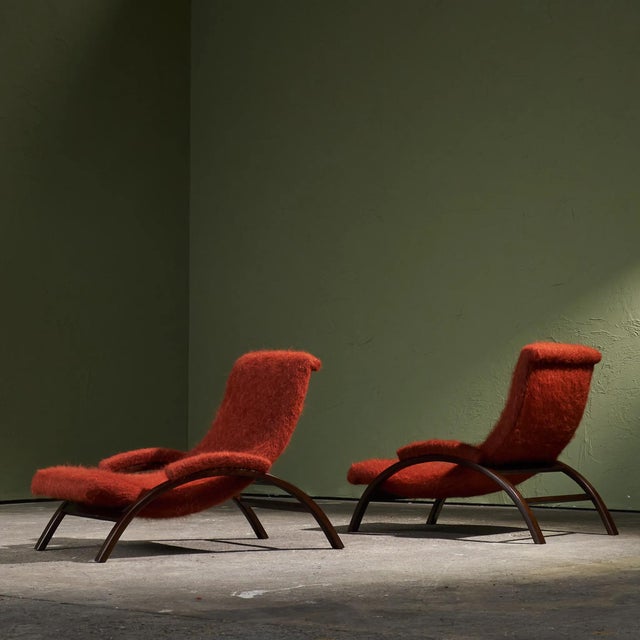 This set features two fully restored Italian lounge chairs dating back to the 1960s. Each chair has been professionally...