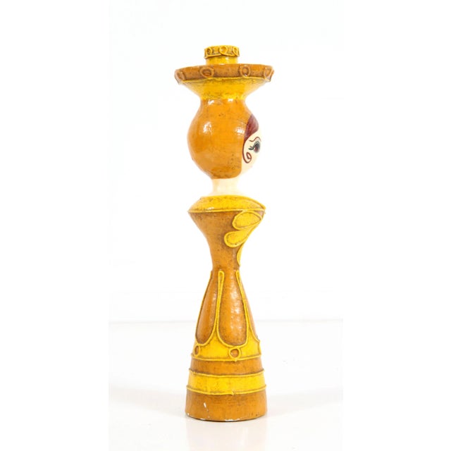 Beautiful vintage c.1960's mid century Mexican paper mache candlestick in the form of a beautiful yellow dress wearing...