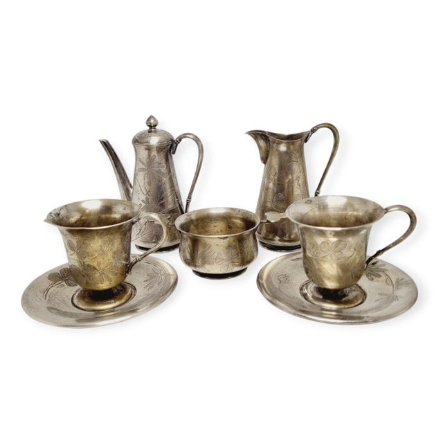 Alpaca silver coffee set, consisting of seven pieces, for two people. Made in the early 1900s. A richly decorated, elegant...