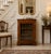 An antique Victorian walnut inlaid glazed pier cabinet of excellent colour and elegant proportions. Finely crafted in...