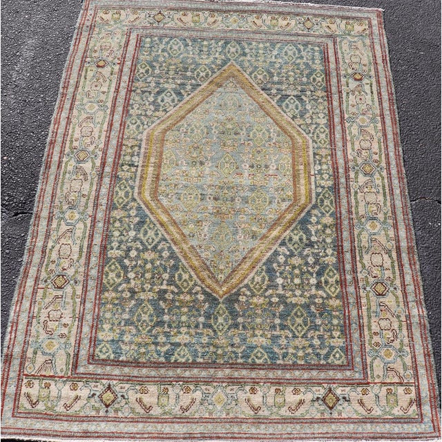 Measures: 3'10 x 5'6 Antique Persian Senneh Rug with Soft Blue Field and Geometric Medallion. Keivan Woven Arts/...