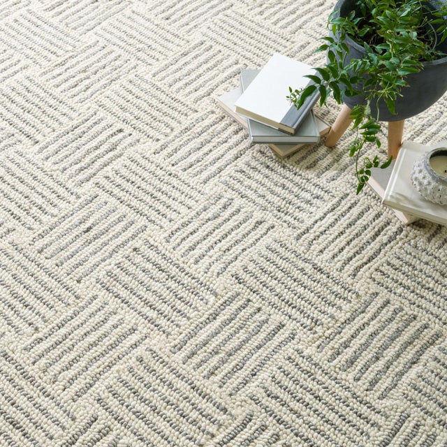 The loopy hooked texture, appealing to the eye as well as underfoot, is a sophisticated foundation with its striped...