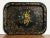 A fine large English black lacquered papier-mâché tray from the Aesthetic Movement period, featuring a decorative painting...