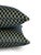A deep royal blue or others call navy diamond pattern velvet pillow cover. In between the diamond lines are a goldish...