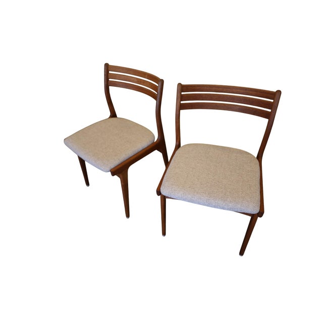A very elegant set of six exclusive dining chairs in solid teak, model u20, designed by the renowned danish furniture...