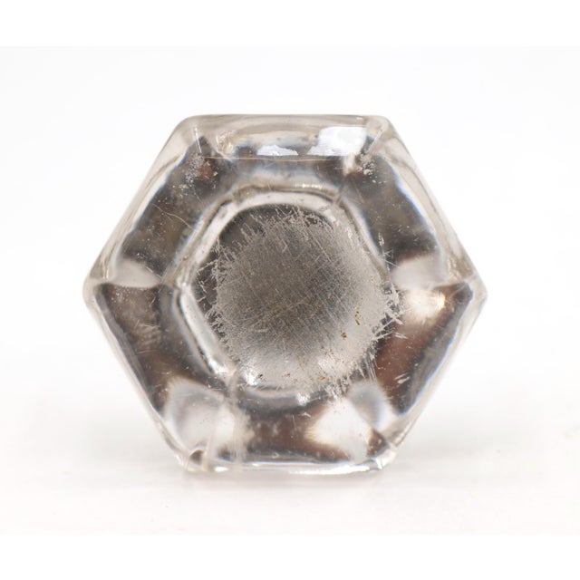Vintage clear glass cabinet or drawer knobs in a hexagon shape with brass shanks. Mounting screws are included. Good...