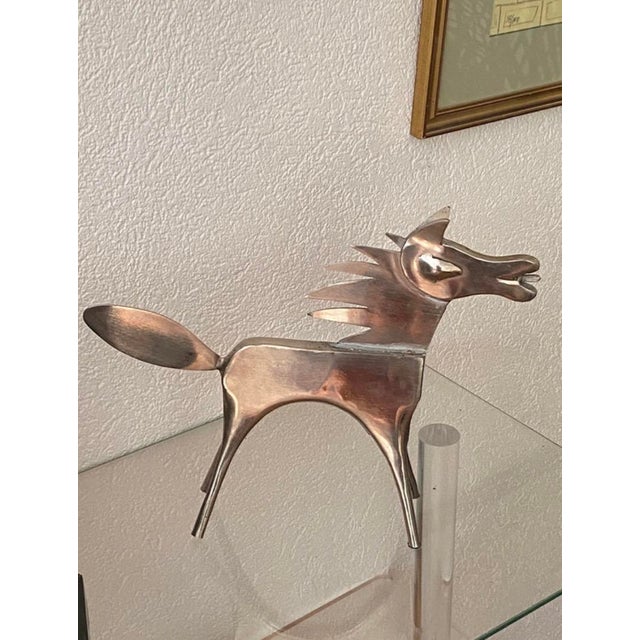 Sculpted metal horse. Silver-colored, solid structure, the horse weighs 1.25 kg. Unique piece. Handcrafted. In good...