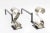 Scroll design andirons, nickel-plated with black iron.