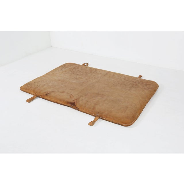 This 1930s Belgian industrial gym mat is a superb example of early 20th‑century athletic equipment, crafted in thick,...