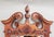 This stunning late 20th-century beveled wall mirror perfectly captures traditional Chippendale style with a rich walnut...