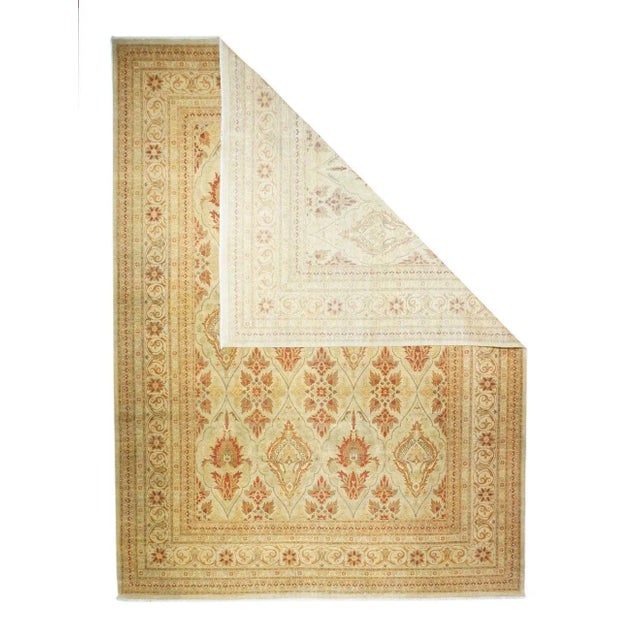 From an esteemed NW Persian city with long artistic tradition, this well-woven modern carpet shows a sand field divided...