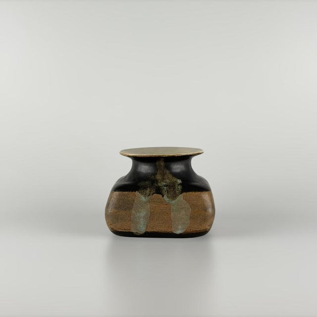 A rare and highly expressive ceramic vase by bruno gambone, one of the most refined voices in italian studio ceramics. As...