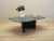 The coffee table was made in the 1980s, Italian production. Table top made of marble, structure made of wood. Surface...
