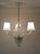 Vintage Murano blown glass chandelier by Barovier & Toso, featuring three lights. The three frosted glass lampshades,...