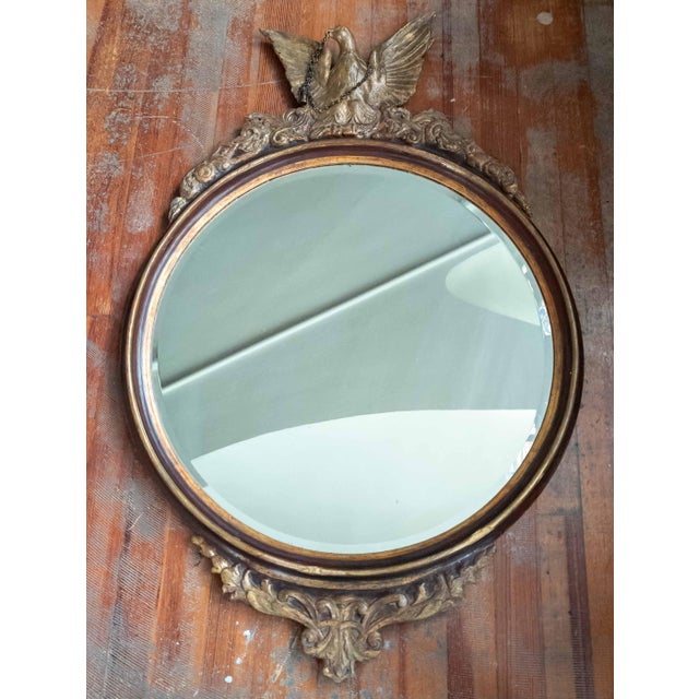 We are selling this large decorative Giltwood Italian mirror. This wall mirror has great form and decoration, with central...