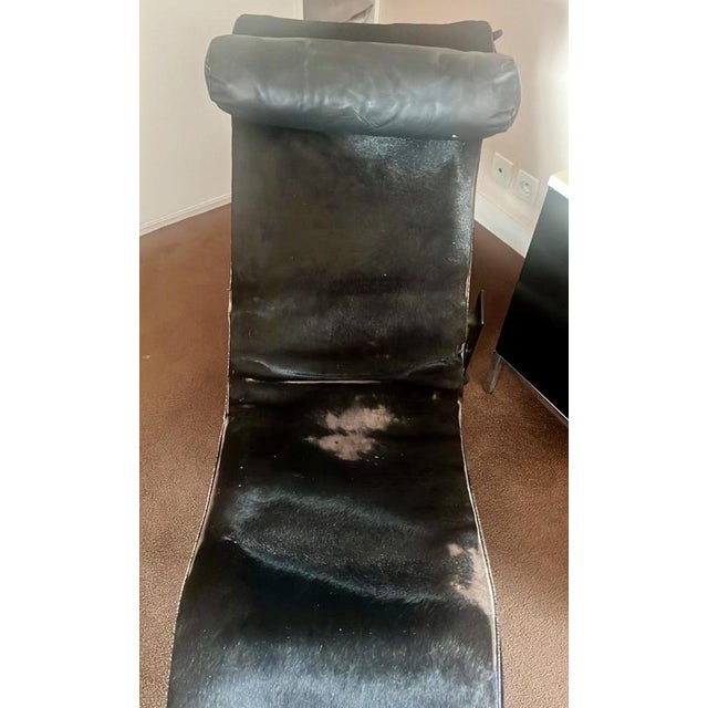 The lc4 chaise longue armchair by cassina, created in 1928 by le corbusier, pierre jeanneret, and charlotte perriand, is...