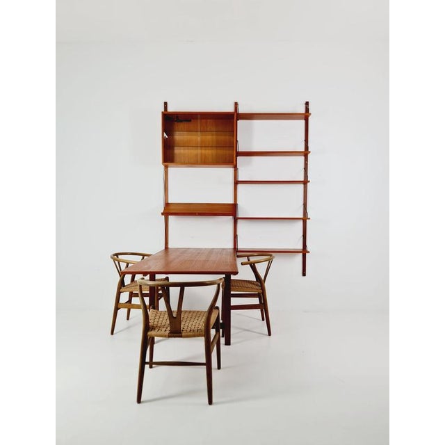 Big mid century danish teak wall unit with showcase and dining table/desk with show case by poul cadovius for cado,...