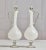 From my personal collection, a striking pair mid-20th century Italian Murano cased glass white decanters. Hand-blown with...