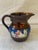 Antique and rare English Lusterware small jug for cream. The dark copper finish is a touch darker. Lots of details on the...