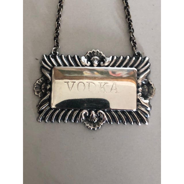 This fabulous Pair of 1950s English Vodka and Bourbon Decanter Tags will add a touch of class and sophistication to your...