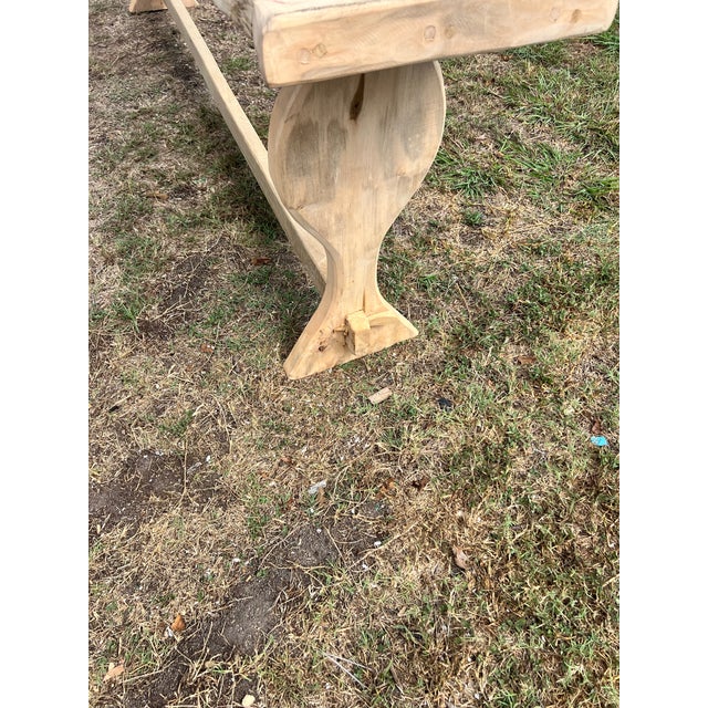 A beautiful French 19th century bleached solid oak console table, featuring a long, thick plank top with a naturally aged...