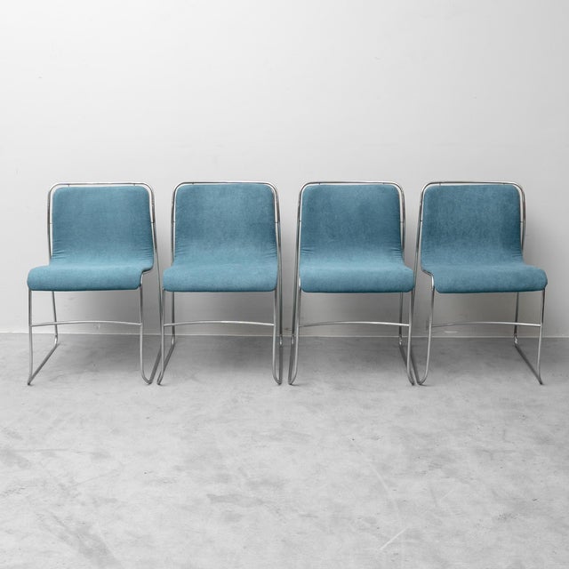 Set of 4 1970s chairs. Chromed metal frame. Blue fabric upholstery. Excellent condition with signs of wear, as shown in...