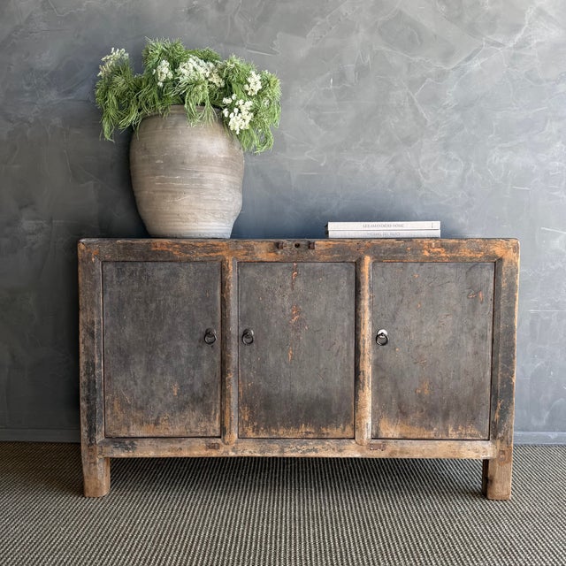 This charming vintage elm wood cabinet is a one-of-a-kind piece with beautiful age and patina that adds character to any...