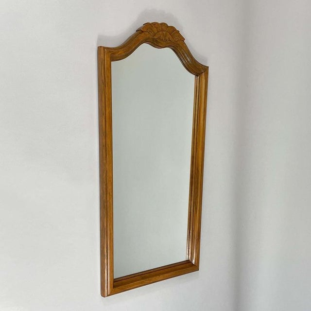 This Art Deco wall mirror was designed and manufactured in Germany in the 1930s to 1940s. The mirror features a tall...