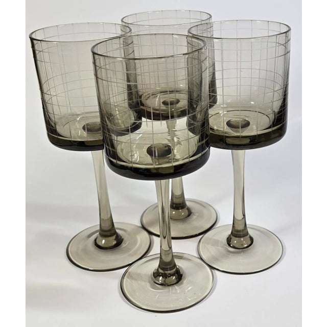 These long-stemmed sweethearts are a smoky brown and etched with what looks to be a city map, though what city is unclear....