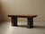 Dining table, crafted in France around 1940, is made of solid wood and veneer in a rectangular form. It rests on two solid...