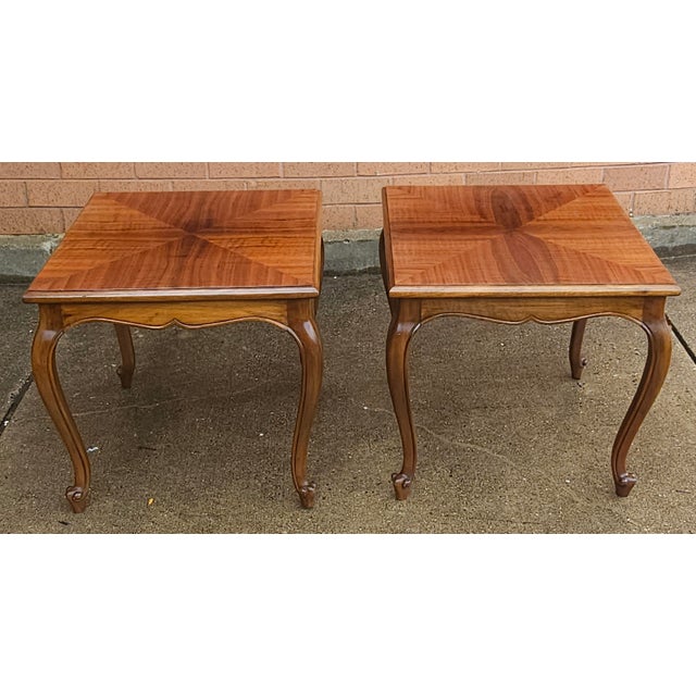 A very fine pair of handcrafted Brazilian Rosewood side tables in the Provincial style. Brazilian Rosewood is one of the...