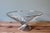 This elegant fruit bowl is a creation of the renowned German manufacturer WMF, celebrated for its excellence in metalwork....