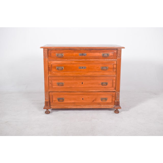 Chest of drawers in shell wood. Comprising four drawers, the chest of drawers offers generous storage space while...