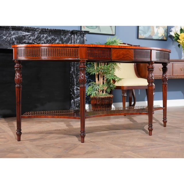 An outstanding, high-quality Long Mahogany Console by Niagara Furniture. The Long Mahogany Console with Brass Gallery also...