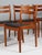 Set of five dining chairs by Poul Volther with frame of oak. New upholstered cushions with black full grain aniline...