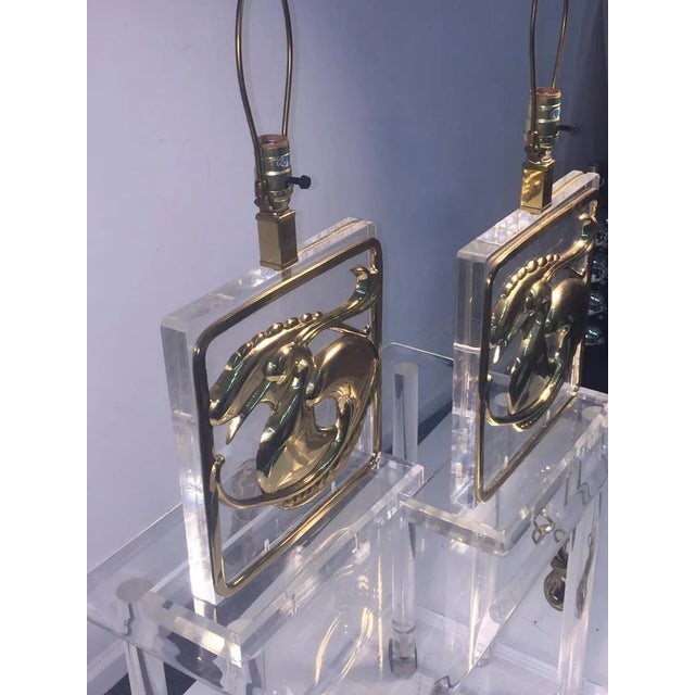 Substantial and Heavy Sculptural Pair of Solid Lucite Lamps with Great Lucite Matched Finials.Decorated with a Beautiful...