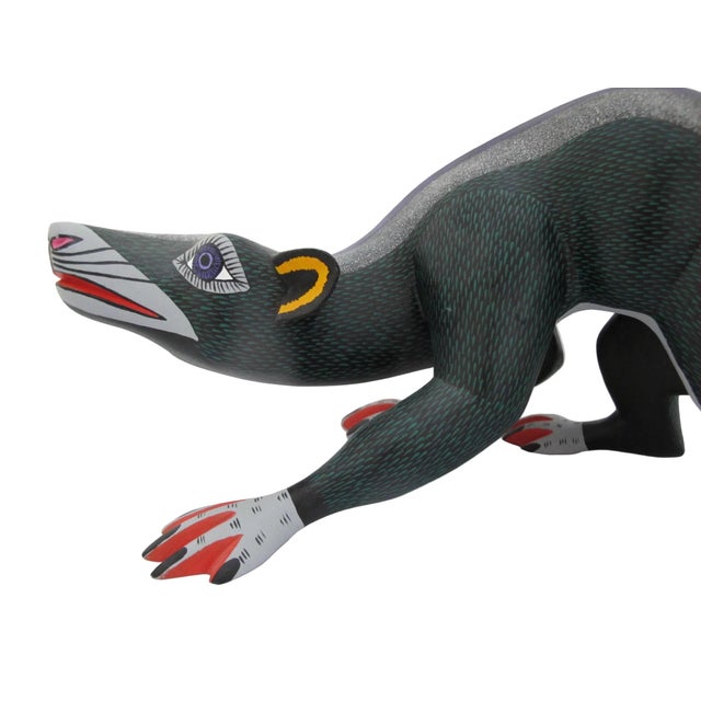 Authentic Oaxacan alebrije, handcrafted by the renowned Susano Morales family workshop in Oaxaca, Mexico. Large, elongated...