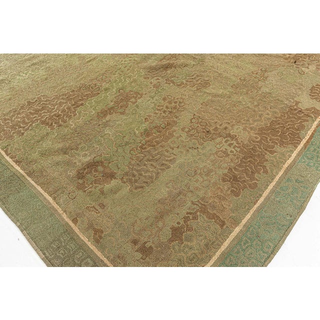 Vintage American Hooked rug Size: 11'4" × 14'2" (345 × 431 cm) This exquisite early 20th-century American hooked rug...