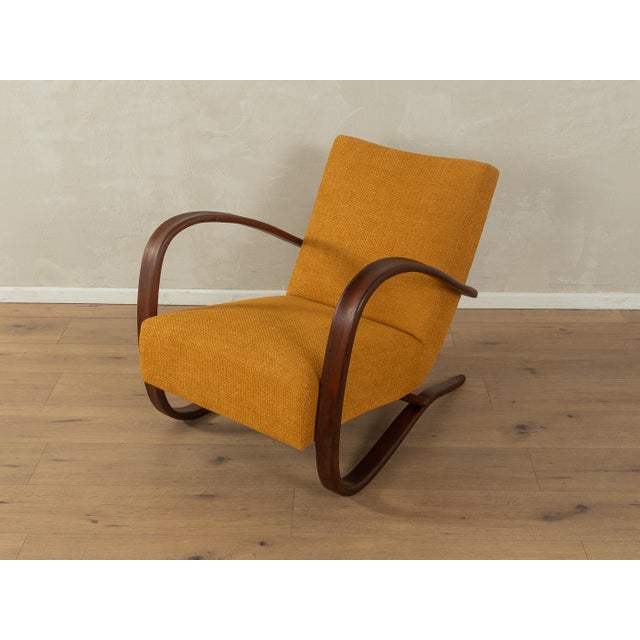 Exclusive Art Deco H-269 armchair by Jindrich Halabala from the 1930s. Delicate frame made of bent ash wood. The armchair...