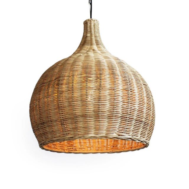 Hand woven raw wicker bell lantern. For indoor use or outdoor use under covered area. Each may have slight variations in...