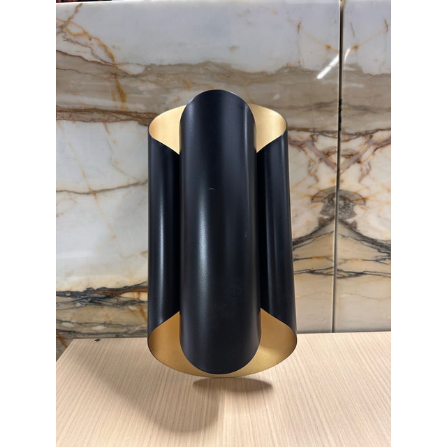 Bring a welcome sculptural touch to your inside walls with the sweeping lines of the Banks Wall Sconce from Hudson Valley...