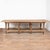 This rustic work table is just under 10' long, reinforces with iron rods and bolts, and resting on eight legs. This long...