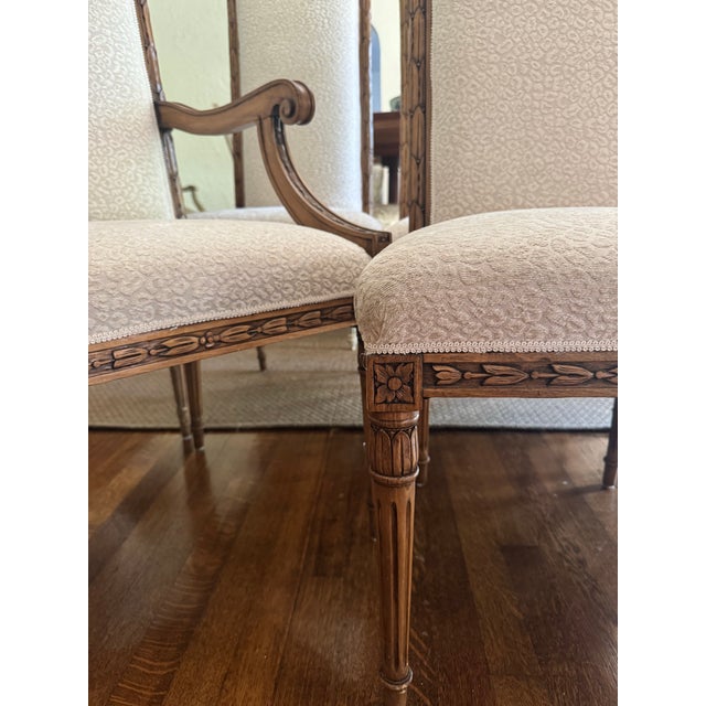 Six (6) French dining chairs (2 arm chairs), beautiful carved frames, newer cream leopard upholstery. Sturdy and comfortable.