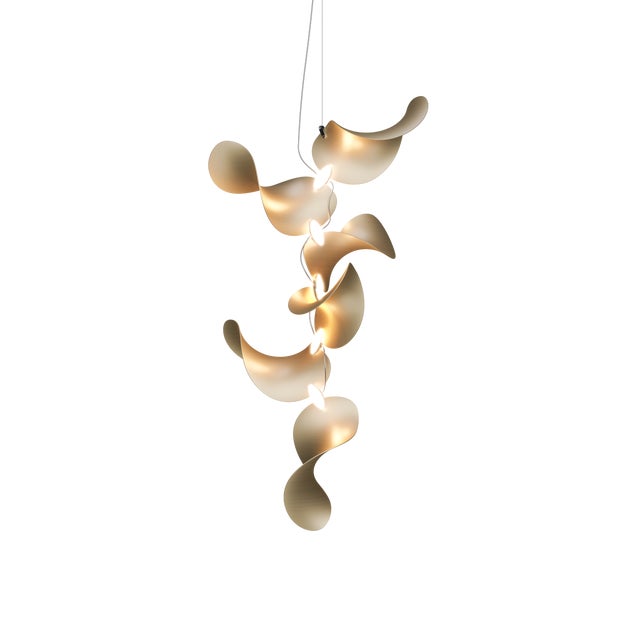 The wide, undulating curves of large sand dunes inspired us to create the modular Dune light fixture. Fascinated by the...