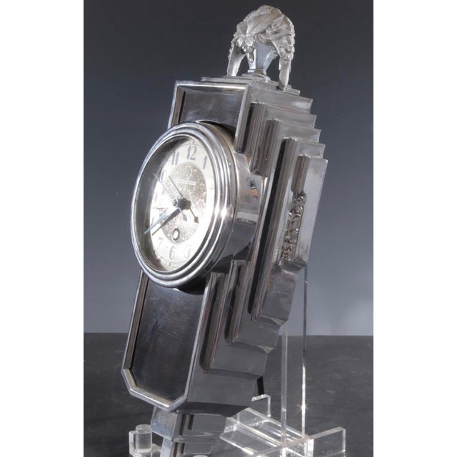 A striking American Art Deco electric mantel clock by Manning-Bowman & Co. of Meriden, Connecticut, dating to the 1930s....